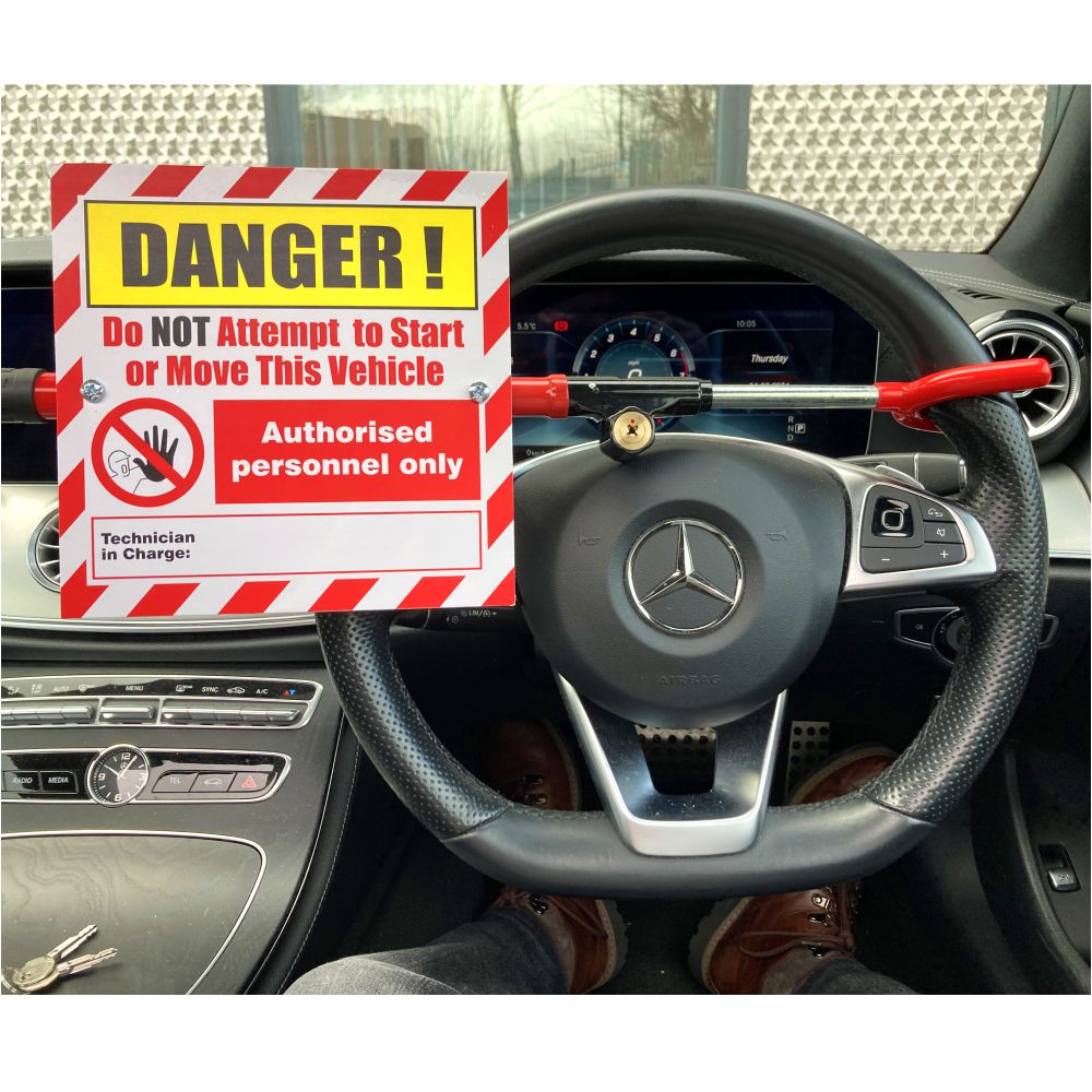 Steering Wheel Lockout with integral Warning Sign Steering Wheel Lockout with integral Warning Sign